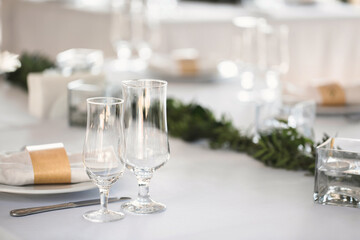 Beautiful setting of the wedding banquet table in the restaurant.
