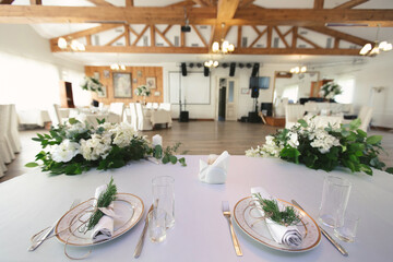 Beautiful setting of the wedding banquet table in the restaurant.