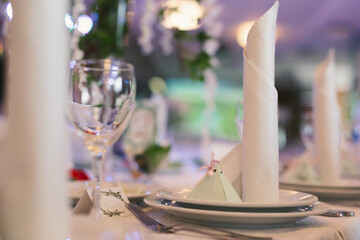 Beautiful setting of the wedding banquet table in the restaurant.