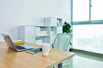 Modern workspace with computer and chair