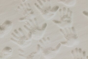 Winter, children's handprints on fresh snow