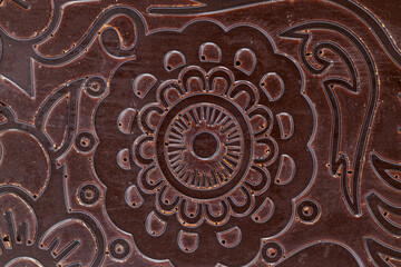 Chocolate background with a beautiful pattern. Macro view of the chocolate background