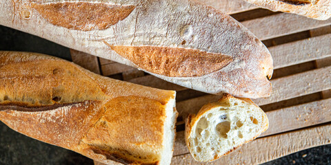 baguette bread seeds french fresh meal food snack on the table copy space food background rustic...