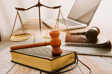 Business and lawyers discussing contract papers with brass scale on desk in office. Law, legal...