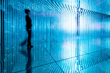 Businesswoman walking in the beautiful bokeh light