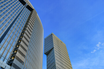 Skyscrapers in the center of a large city. High multi-storey buildings in the center of the metropolis.