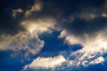 Amazing sky panorama. Great dramatic view. Mystical lighting. Colorful sunset in the evening sky. Meditative calmness and greatness. Clouds illuminated by the setting sun