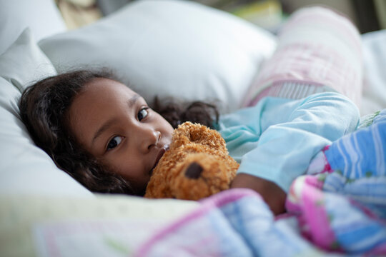 Young Girl Asleep In Bed