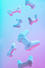 Flying or levitate pattern of game pad joystick on purple pink and blue color background. Minimal...