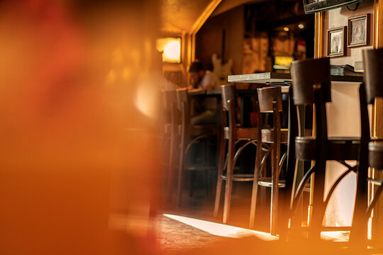 Coffee shop blur background with bokeh light with vintage filter