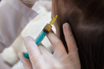 Plasma treatment, plasmolifting or PRP method point the introduction of the patient's own plasma...