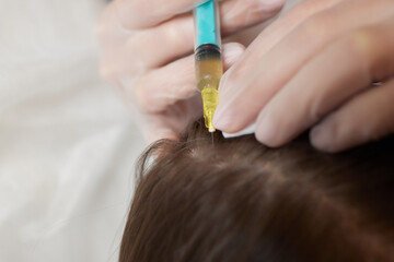 Plasma treatment, plasmolifting or PRP method point the introduction of the patient's own plasma...