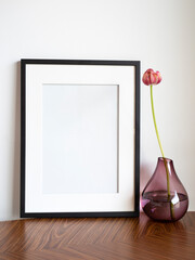 frame with place for text, decoration with a flower in a vase