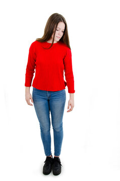 Full length of adorable pretty teenage girl looking down, Isolated on white background