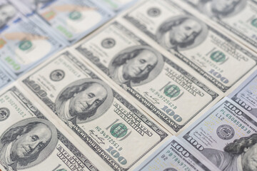 100 US Dollars banknotes, one hundred dollar bills background