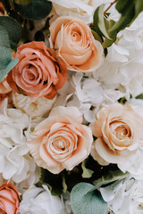 Background of pink flowers with white elements. Vertical floral backdrop.