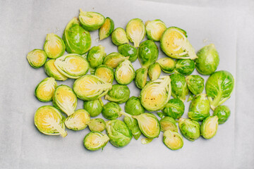 Brussels sprouts. Brussels sprouts cut in half and baked in the oven. Healthy vegetarian food. Texture from vegetable food. A delicious nutritious meal