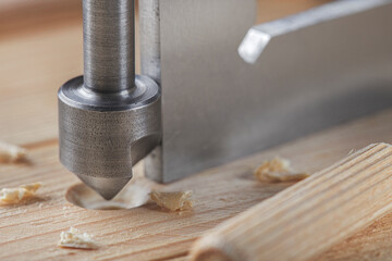 Countersink drill bit make sink in hole for screw in old wooden plank