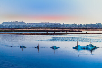landscape with lake at the time of sunrise.