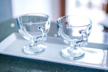 Two empty dessert glasses. Preparing for breakfast. Table setting