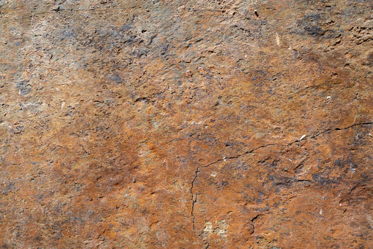 Superf&iacute;cie de pedra texturizada com algumas pequenas rachaduras