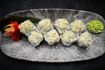 Sushi roll Volcano, with wasabi and ginger