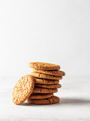Stack of oatmeal cookies on white background