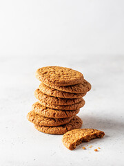 Stack of oatmeal cookies on white background