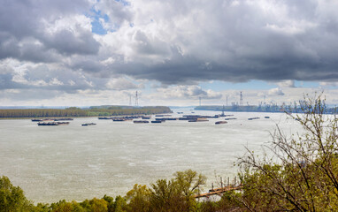 Many barges blocked on the Danube between Galați and Brăila in Romania in the spring of 2022. The context is the war in Ukraine. High resolution.