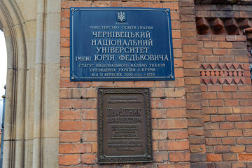 Plate at the entrance to the National University of Chernivts