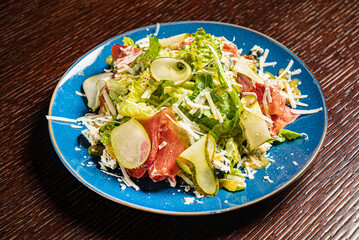 tasty salad with parma and cheese