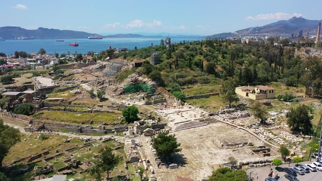 Aerial drone video of iconic archaeological site and Sanctuary of Ancient Elefsina mainly known for the Great Mysteries - the Eleusinian Mysteries, Attica, Greece