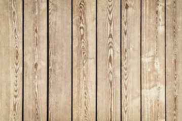 Wood texture of vertical boards of the wall.