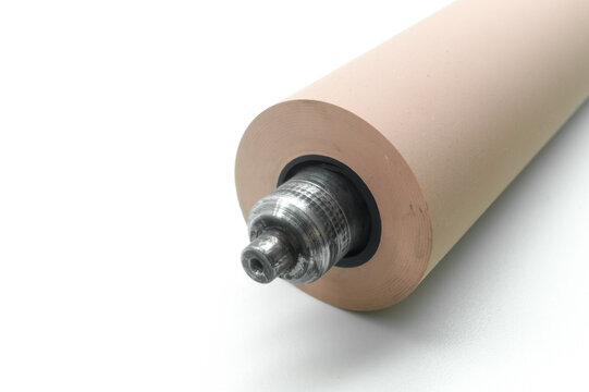 Anilox roller for flexographic printing machine. Raster cylinder for transferring ink to the printing roller. Selective focus, isolated on white