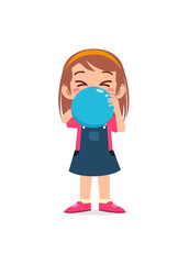 little kid standing and blowing a balloon