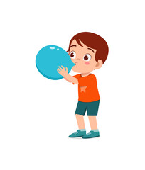 Fototapeta premium little kid standing and blowing a balloon