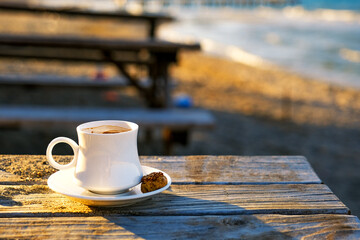 Glass of traditional Turkish coffee at the seaside.