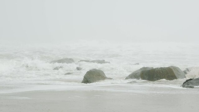 Foggy Beach with Rocks