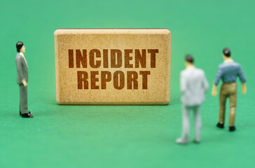 On the green surface are figures of people and a sign with the inscription - Incident report