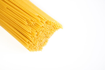 raw spaghetti on a white background.