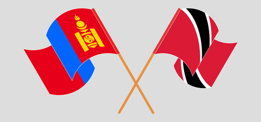 Crossed and waving flags of Mongolia and Trinidad and Tobago
