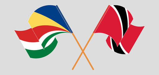 Crossed and waving flags of Seychelles and Trinidad and Tobago