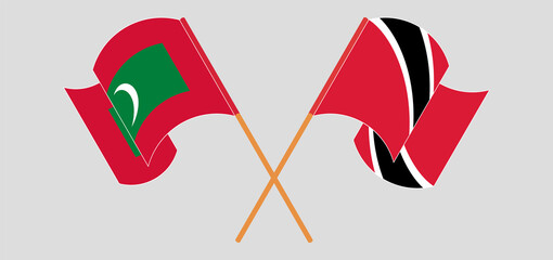 Crossed and waving flags of Maldives and Trinidad and Tobago