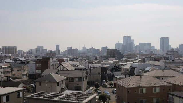 The cityscape seen from the apartment and the time lapse of the Shinkansen.