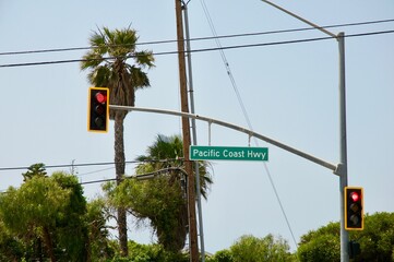 Pacific coast highway sign hanging on light pole Malibu California