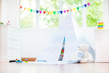 Kids room with teepee tent. Child bedroom.