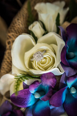 Fototapeta na wymiar bouquet of pink roses on blue background