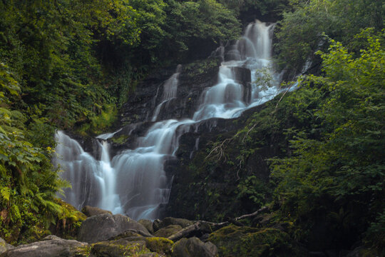 Beautiful view of the Torc Waterfall in long exposure in the Killarney National Park, Ireland
