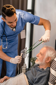 Healthcare professional preparing a patient for oxygenation