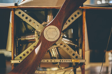 Vintage airplane propeller on the front of an old restored airplane